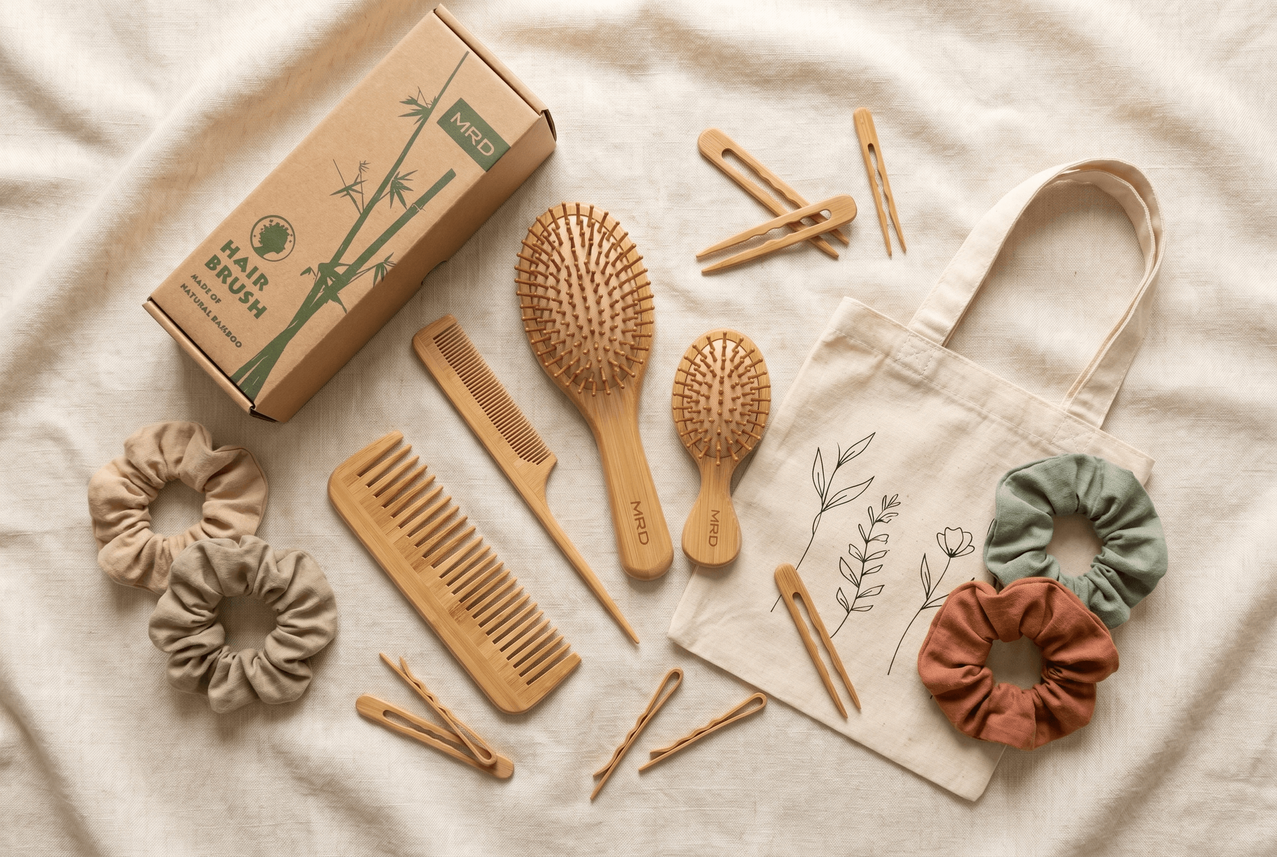 Natural bamboo hair comb and eco accessories flat lay