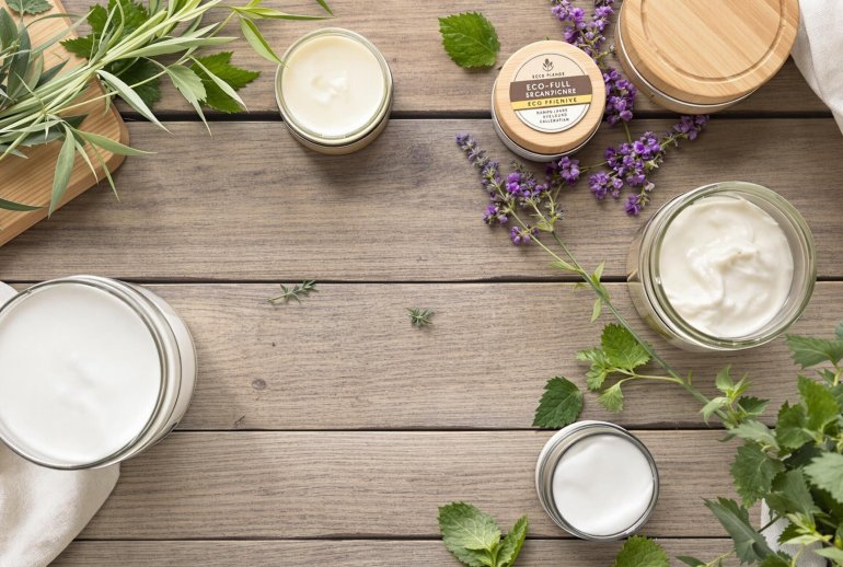 Eco-friendly skincare products on rustic wood.