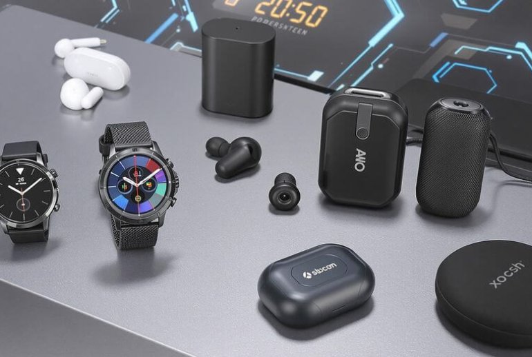 Modern gadgets for men displayed on a sleek surface.